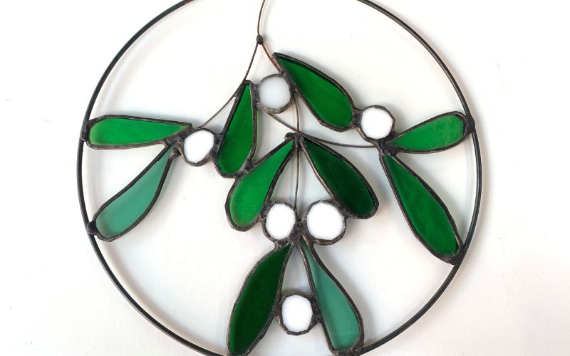 Stained glass mistletoe decoration.
